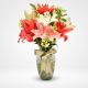 Florero de cristal con lirios – Flores Medellín