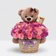 Canasta de rosas rosadas y lila con oso de peluche y Ferrero Rocher – Flores Medellín